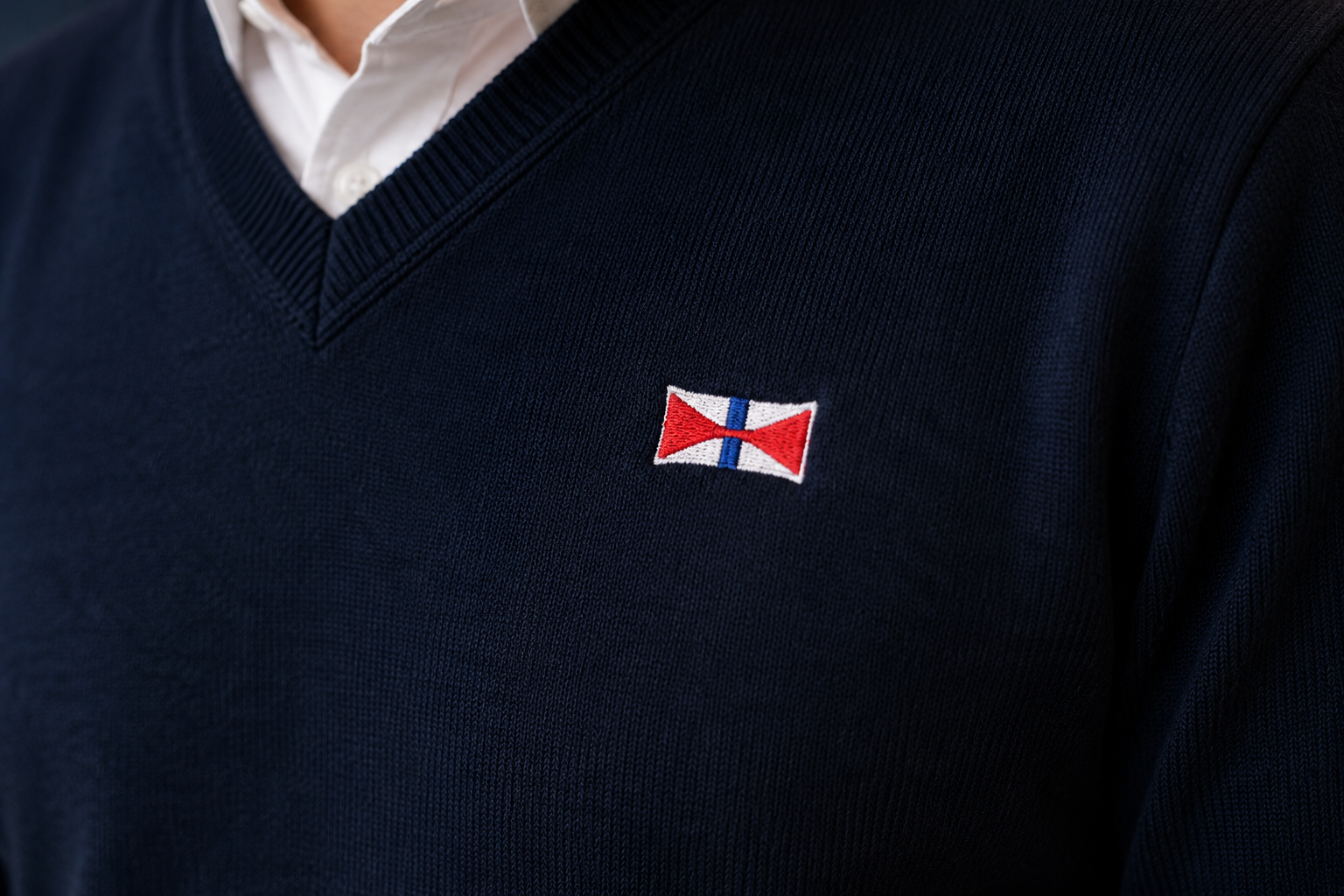 Swire knitwear — embroidery and merino texture detail